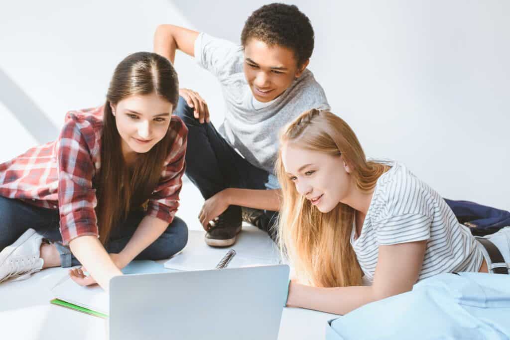 Students studying online at Bradford International Virtual School, engaging in virtual learning environment.