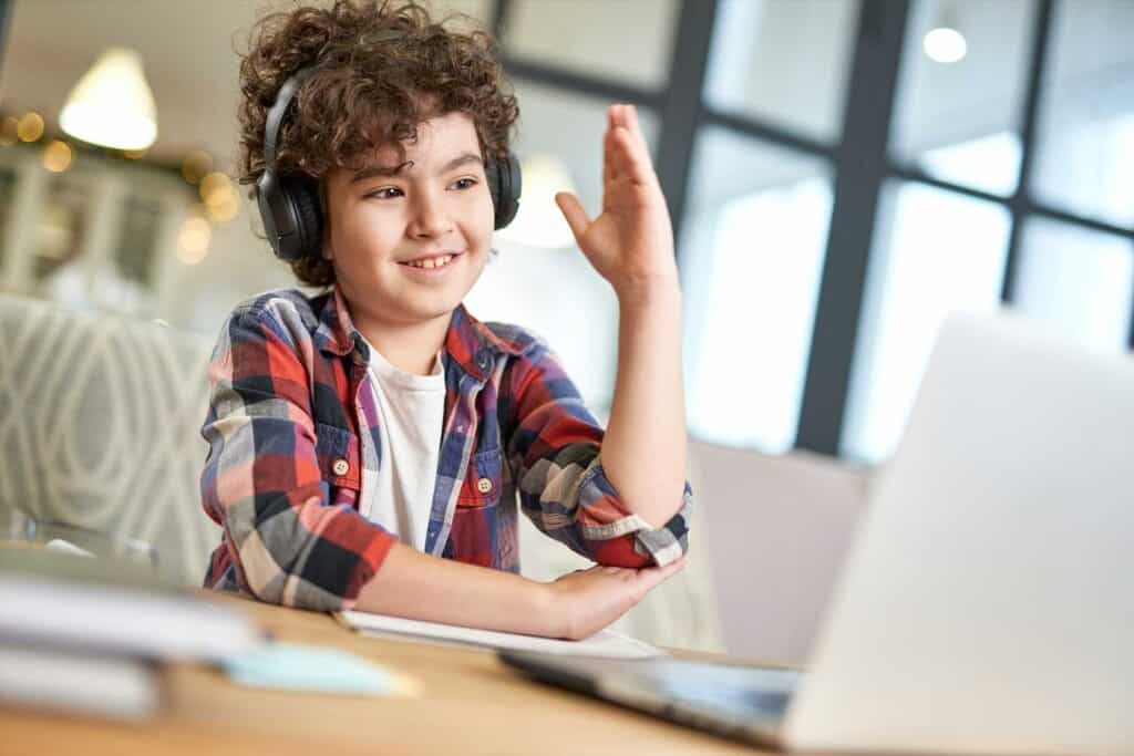 Bradford International Virtual School student participating in online learning with headphones